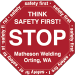 Red on white vinyl stop sign Matheson Welding hard hat decal