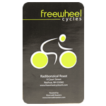 Black and yellow cyclist logo and address on white gloss rectangle Freewheel Cycles custom roll label