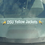 Two yellow jacket wasps on clear rectangle DSU Yellow Jackets custom window decal on back car window.