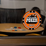 Round black and orange permanent window decal with World Tavern Poker 2012 logo.