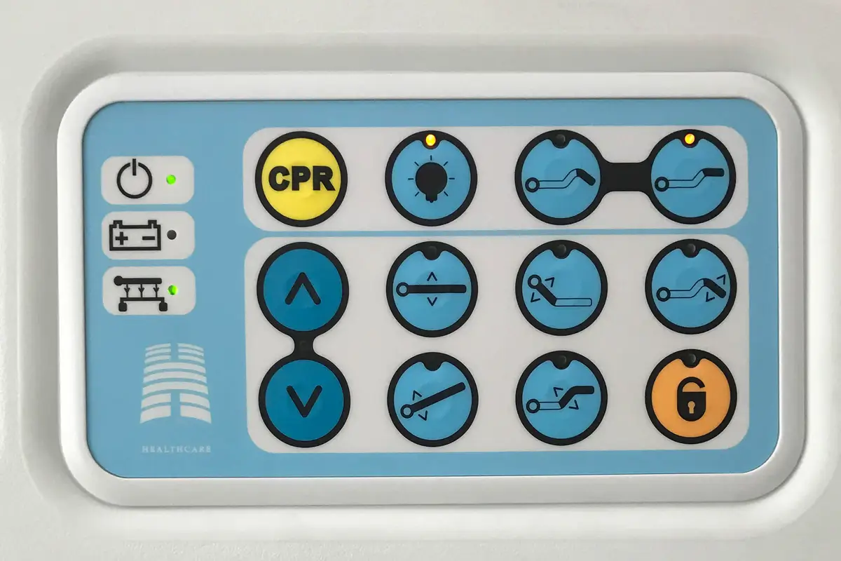 Graphic overlay printing with labeled buttons for CPR, adjustments, and locking functions.