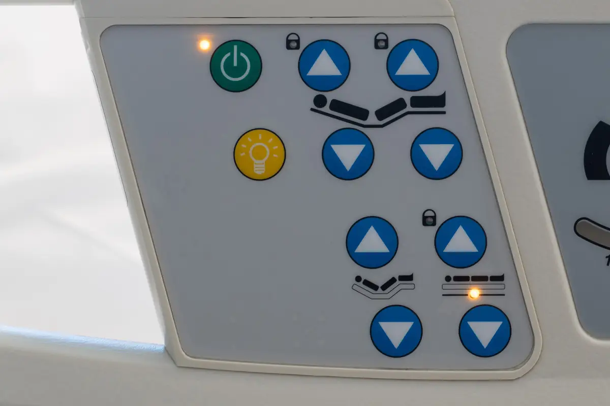 Custom graphic overlay with control buttons for power, adjustments, and directional functions.