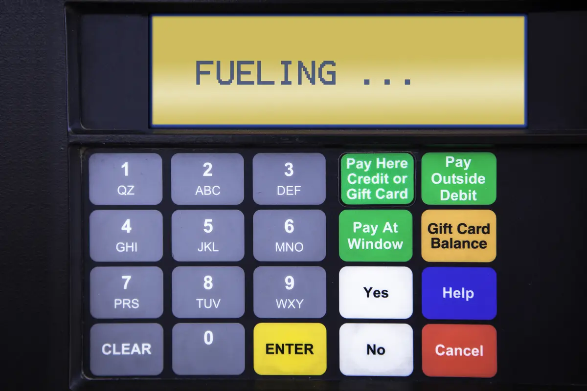 Graphic panel with a keypad featuring labeled buttons and a digital display for system operations.